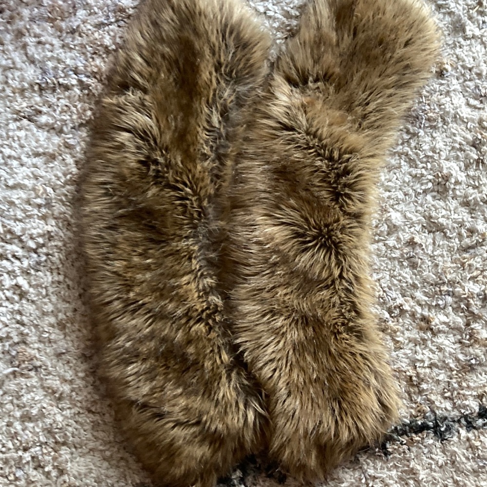 Two faux fur pieces. Very pretty. Light brownish in color.